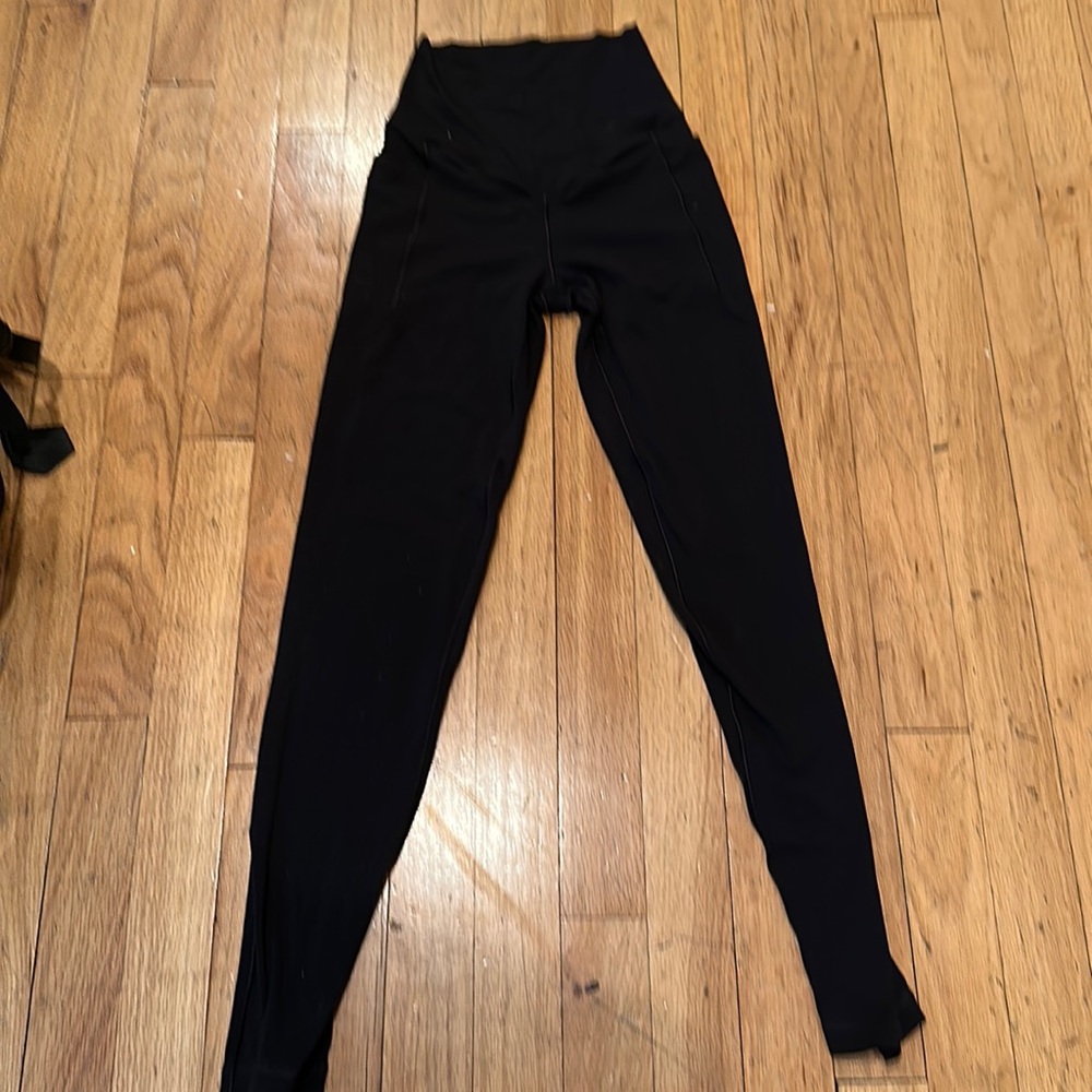 My daughter grew out of these. They are black aerie crossover leggings.